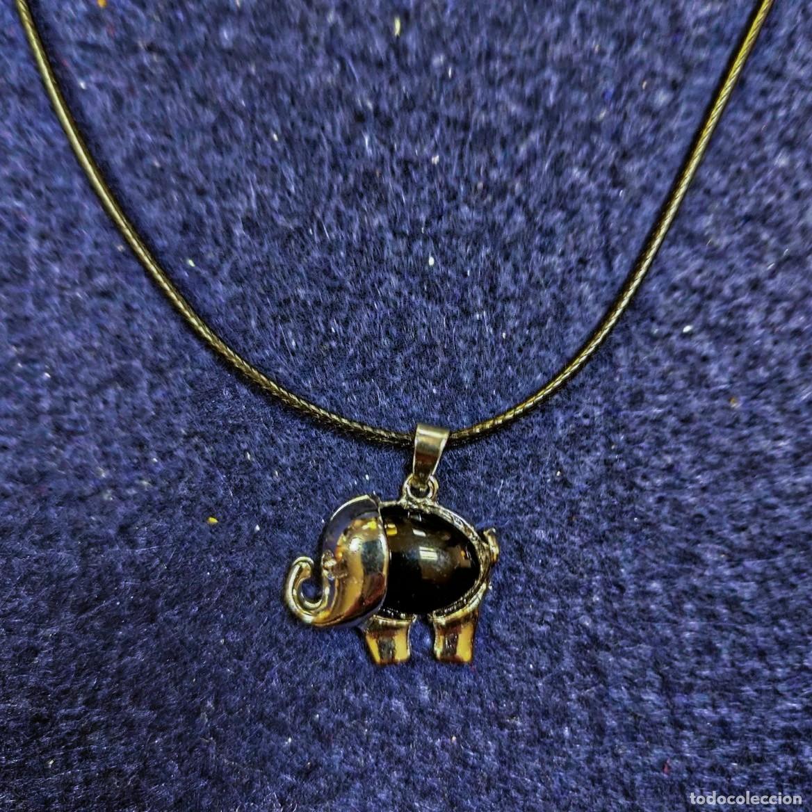 Jewelry: COLGANTE ELEFANTE ALPACA CON CABUJON ONICE ELEFANTE Y CORDON. MED. 30 X 27 MM ALPACA PLATEADA