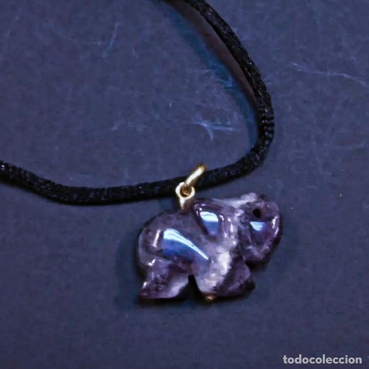 Jewelry: COLGANTE DE ORO AMARILLO CON ELEFANTE EN AMATISTA. ORO DE LEY.