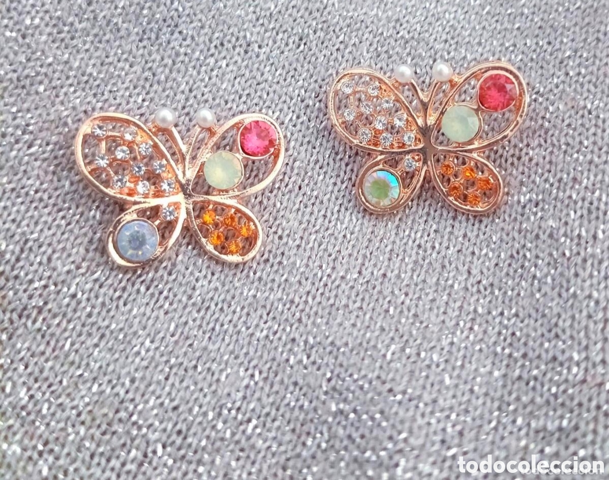 Joyeria: Originales pendientes dorados de mariposa con incrustaciones brillantes 2cmx1,5cm aprox. Muy bonitos