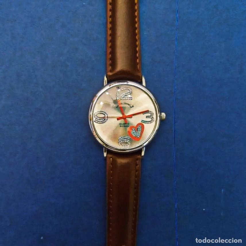 Joyeria: RELOJ DE CORREA CUERO MARRON O POLIPIEL Y ACERO. GIORGIE VALENTIAN. ESFERA PLATEADA. QUARTZ