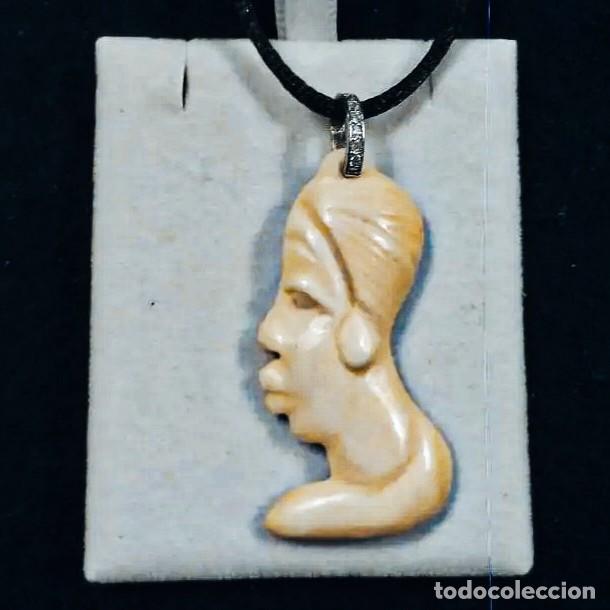Jewelry: COLGANTE DE FIGURA AFRICANA EN HUESO CON PLATA Y CIRCONITAS.PLATA DE LEY