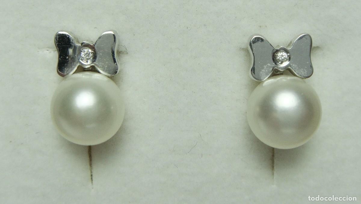 Joyeria: Pendientes infantiles en ORO blanco 18K &bull; Con motivo lazo, perla y diamante