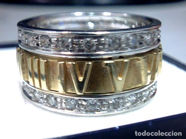 Joyeria: anillo oro 18 kts giratorio