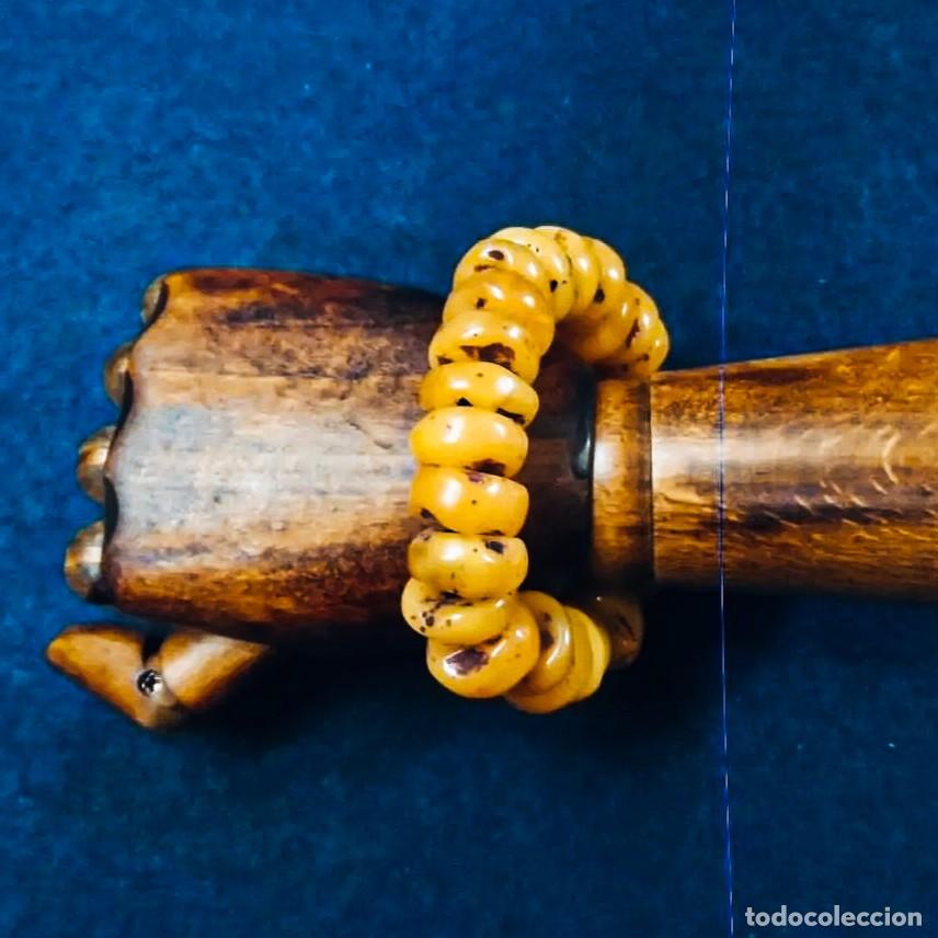 Joalharia: PULSERA ELASTICA DE AMBAR O RESINA EN DONUTS AMARILLOS. MED. 20 X 7 CMS
