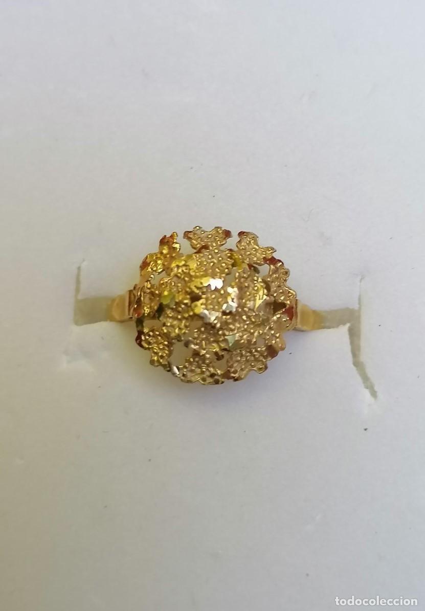 Joyeria: Sortija oro 18K, punzonada