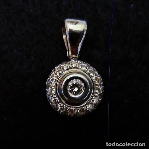 Joyeria: COLGANTE EN ORO BLANCO ORLA CON BRILLANTES APROX. 0,70 CTS. MED. 25 X 15 MM. ORO 18 KTS