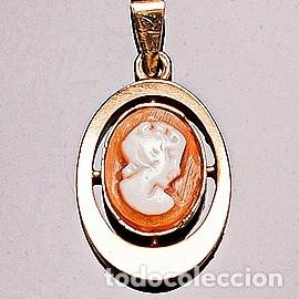 Joyeria: Colgante camafeo con busto de dama, montado en oro amarillo 18 K. 25 mm.