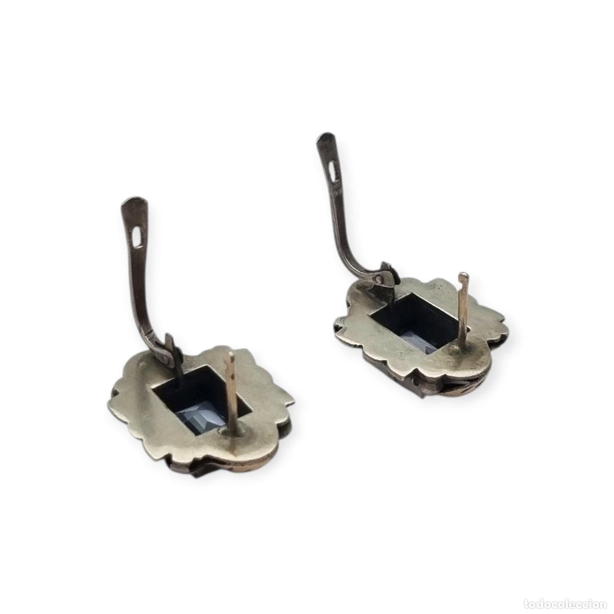 Joyeria: Pendientes Art D&eacute;co catal&aacute;n de plata con vistas de oro y piedra azul circa 1930.