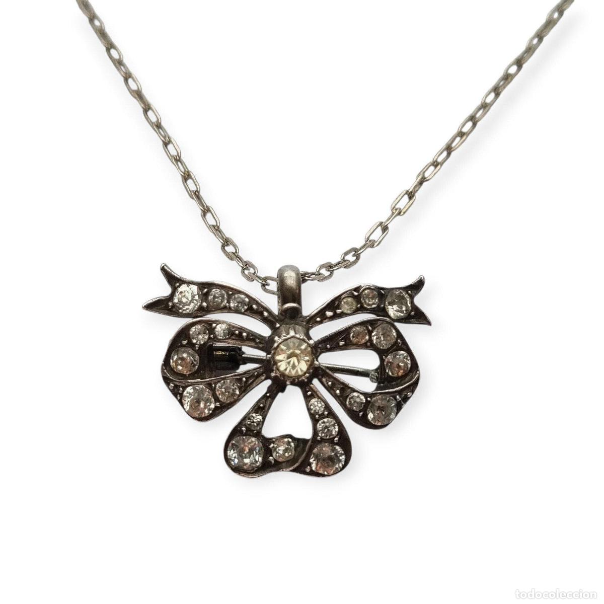 Joyeria: Colgante lazo Art D&eacute;co en plata, broche antiguo, Europa Circa 1930-40