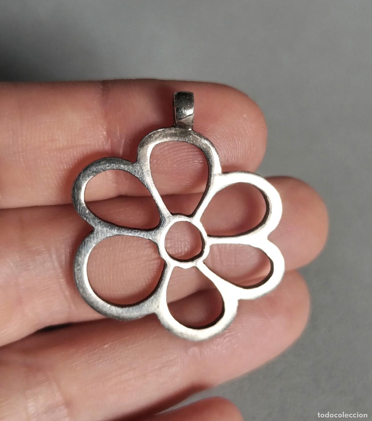 Joyeria: Colgante de plata de ley, flor.