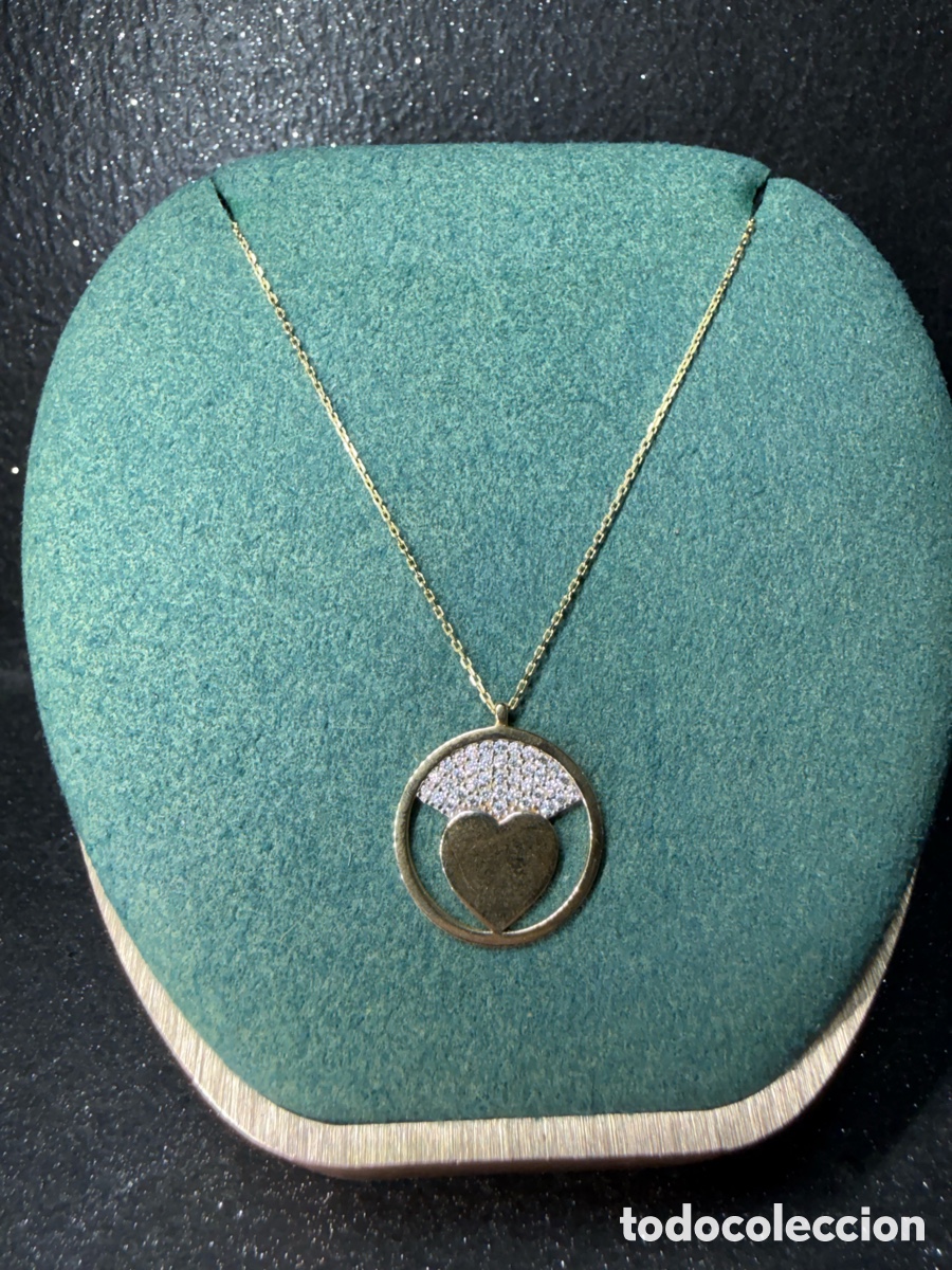 Joyeria: Collar con colgante coraz&oacute;n y diamantes