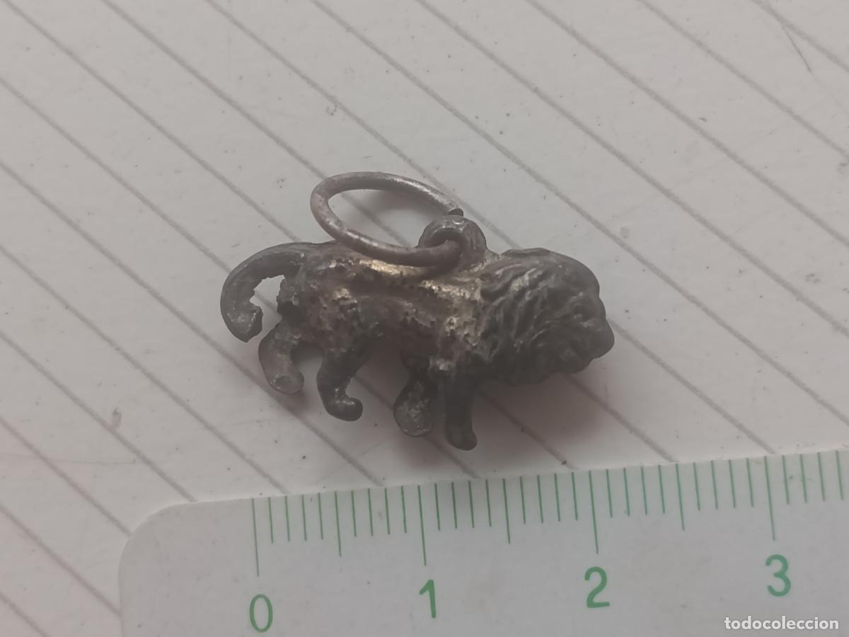 Joyeria: colgante antiguo. Le&oacute;n