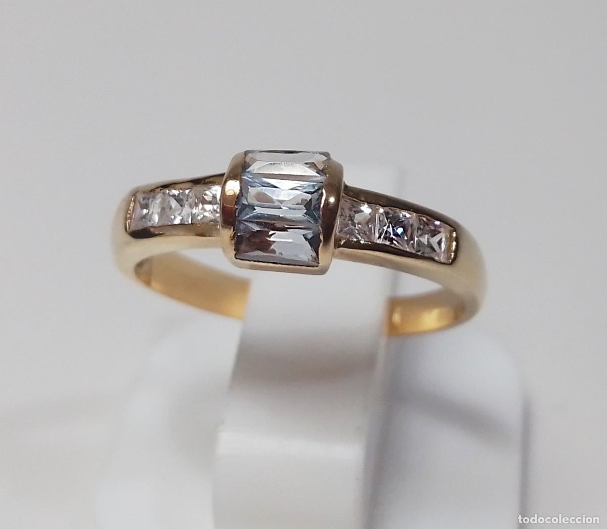 Joyeria: Precioso anillo de plata de ley con circonitas y centro en color aguamarina - Talla 14