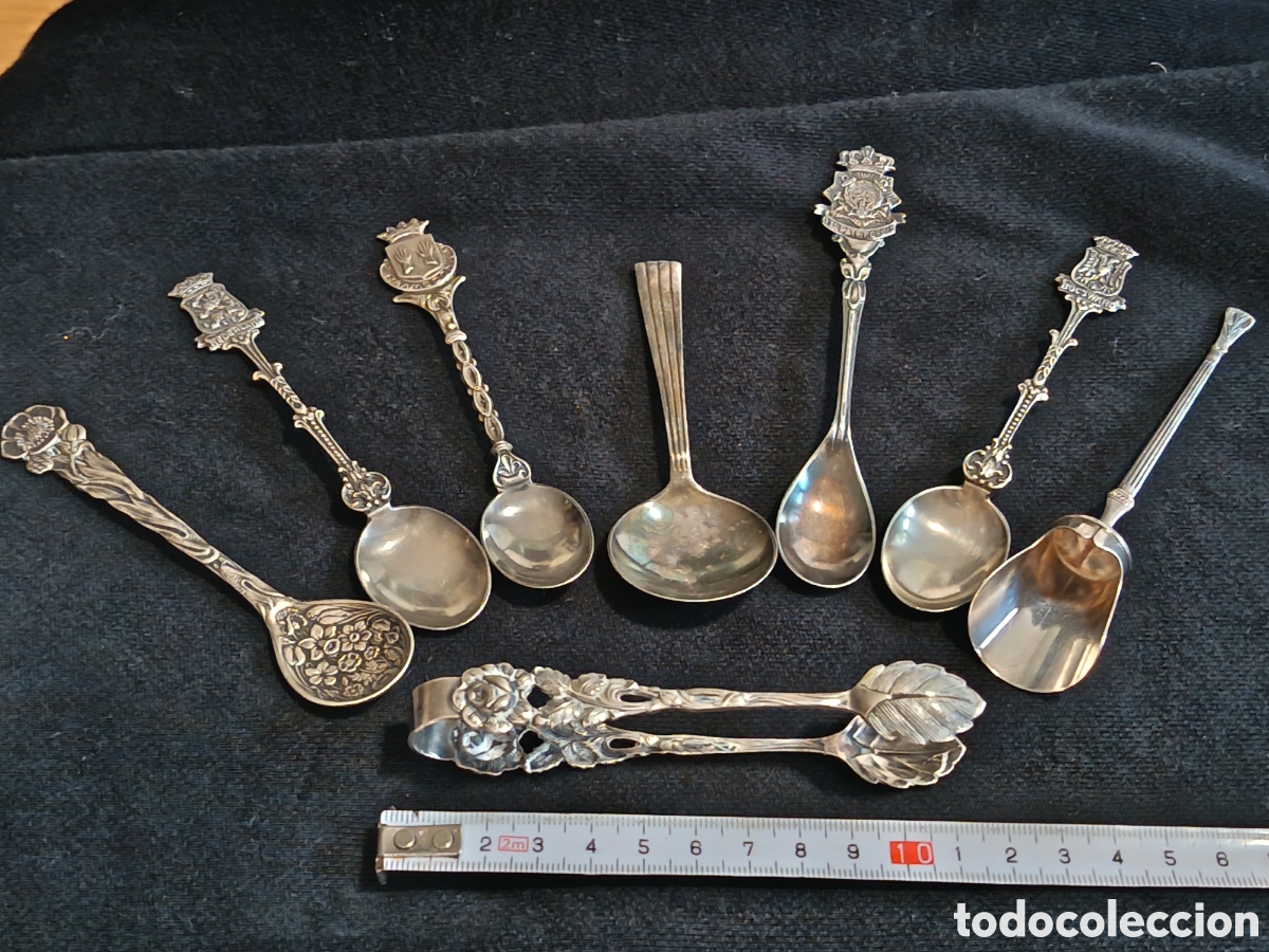 Joyeria: Lote de 7 cucharas y una pinza , todo de plata