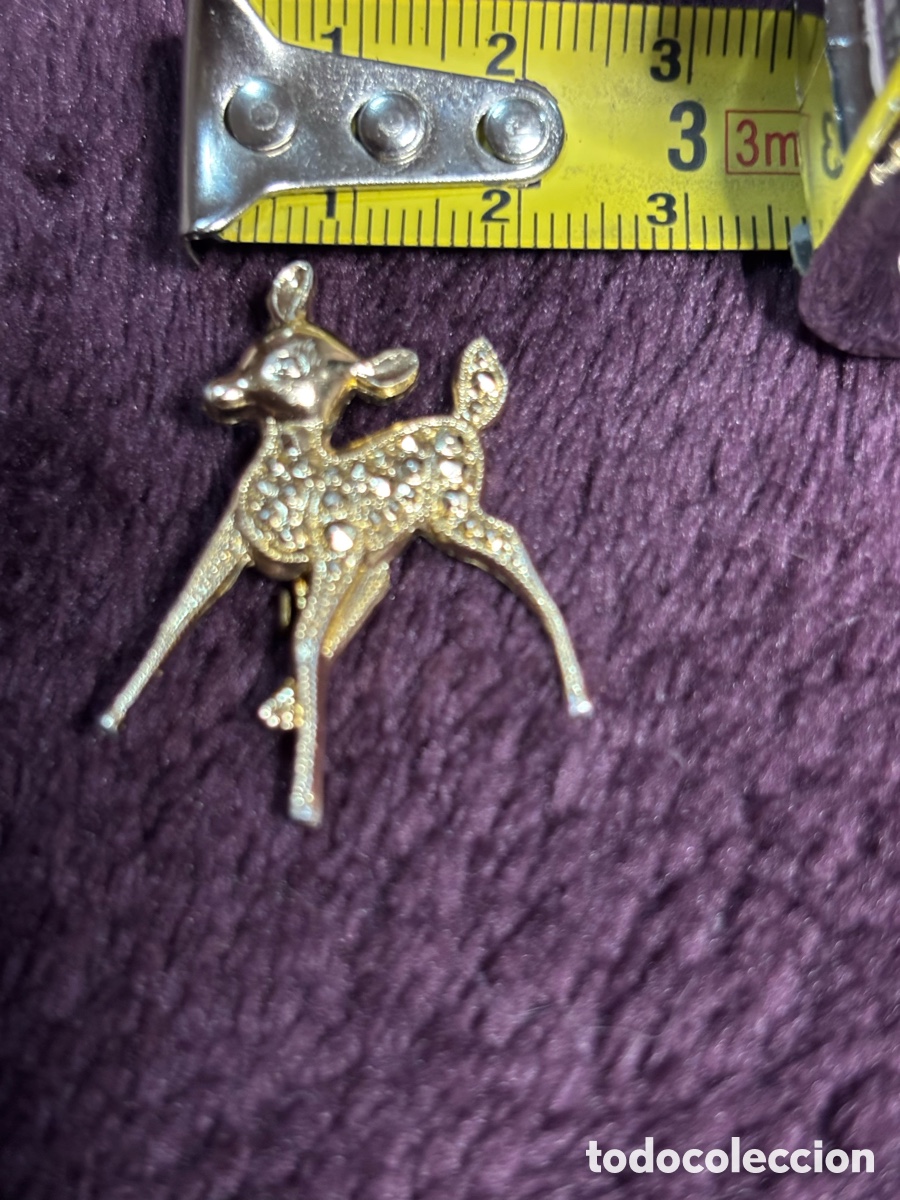 Joyeria: Peque&ntilde;o broche metal dorado