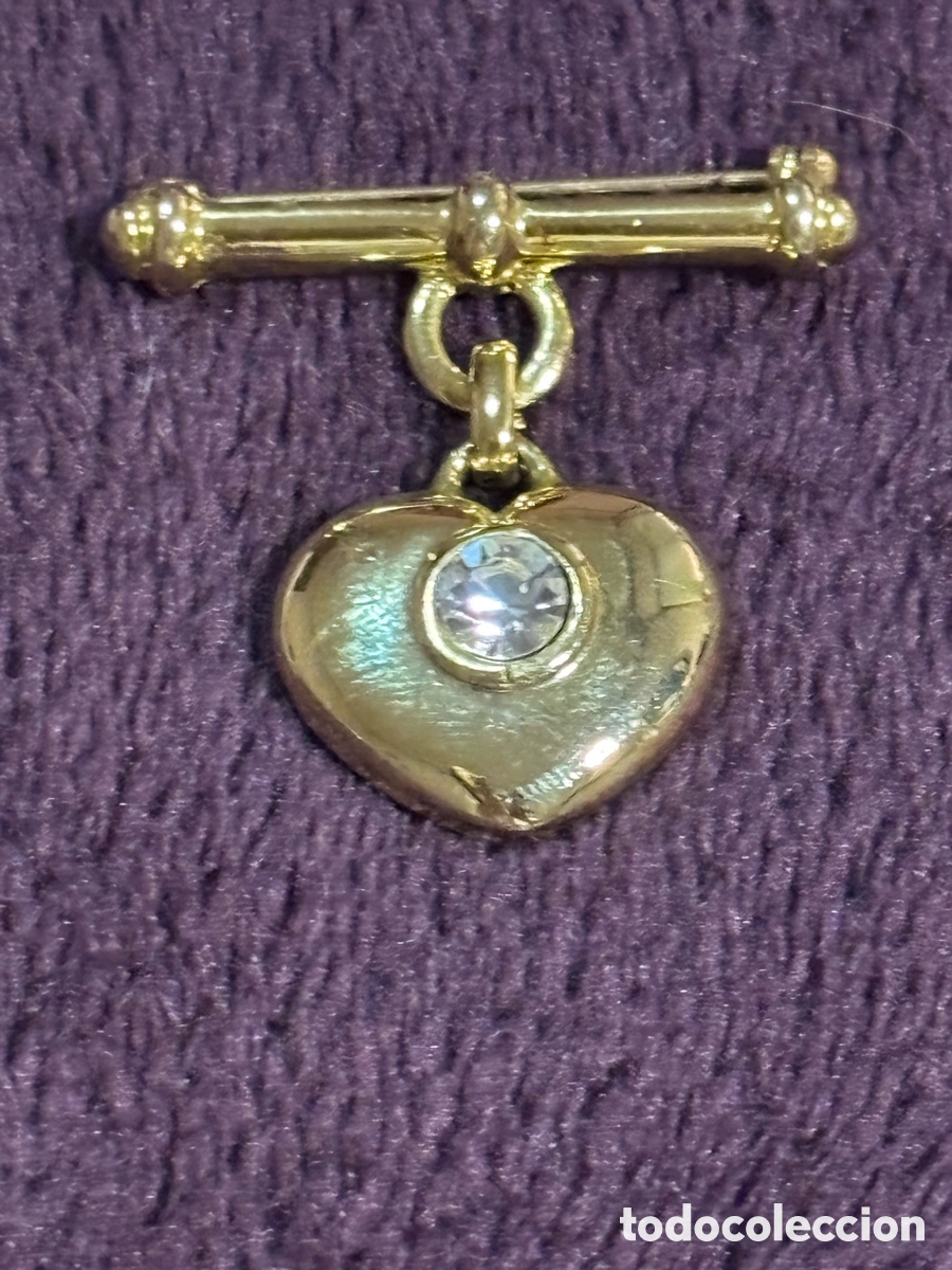 Joyeria: Broche de metal dorado