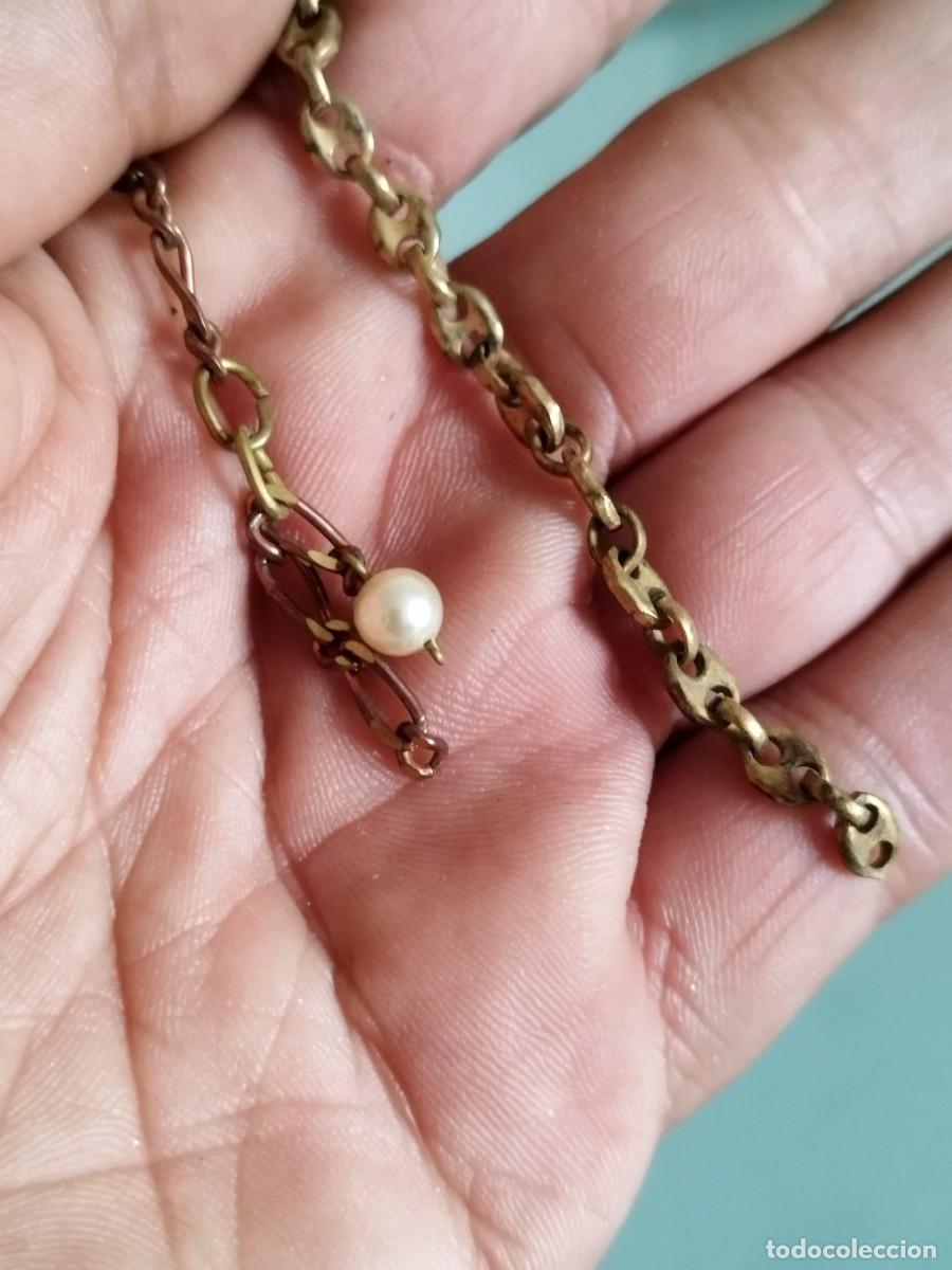 Joyeria: Dos antiguos trozos de cad na o pulsera de eslabones met&aacute;licos a identificar.