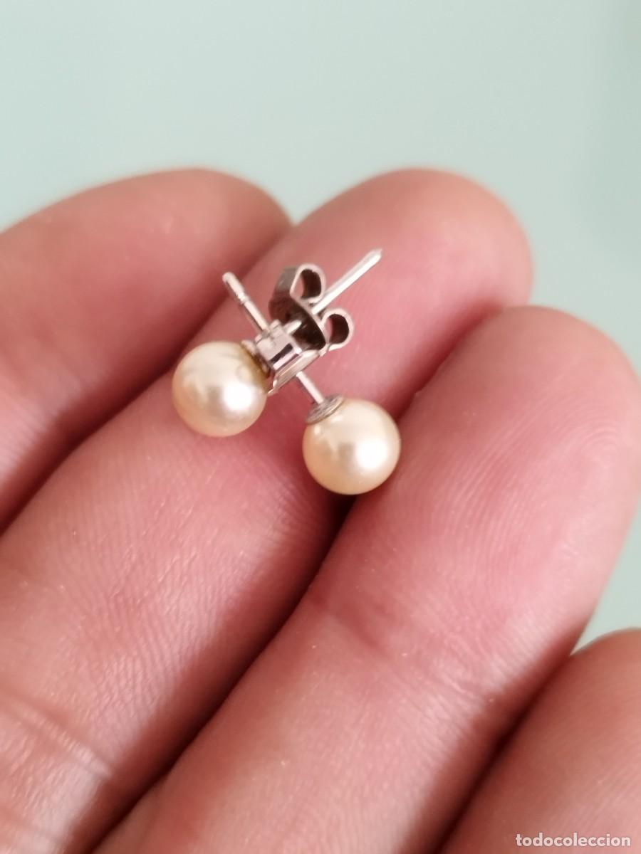 Joyeria: Antigua pareja de pendientes de tipo perlas a identificar.