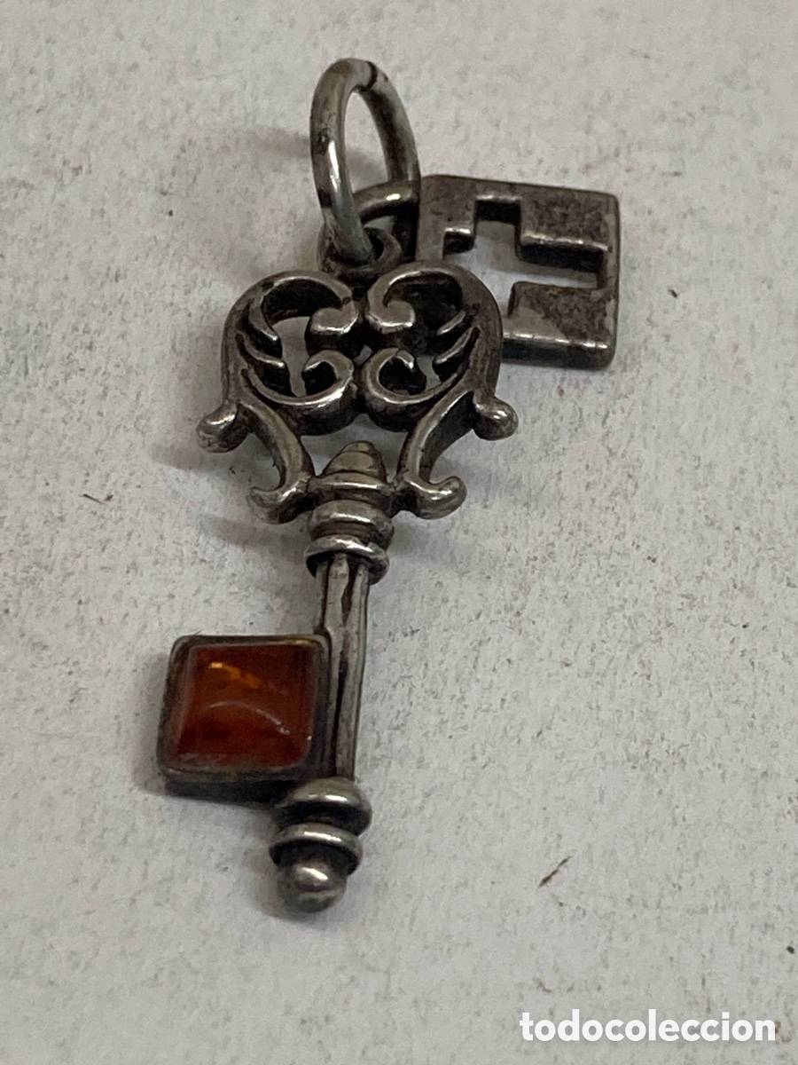 Gioielleria: Colgante de plata y ambar C579
