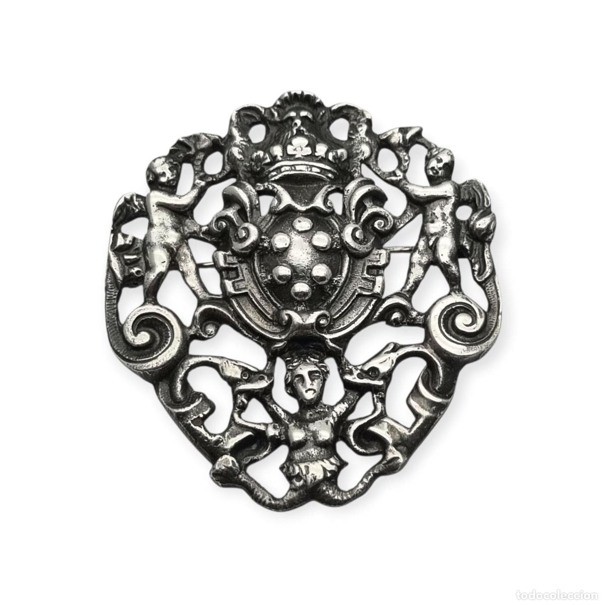Joyeria: Broche de plata neorrenacentista, escudo her&aacute;ldico con querubines Italia s.XX
