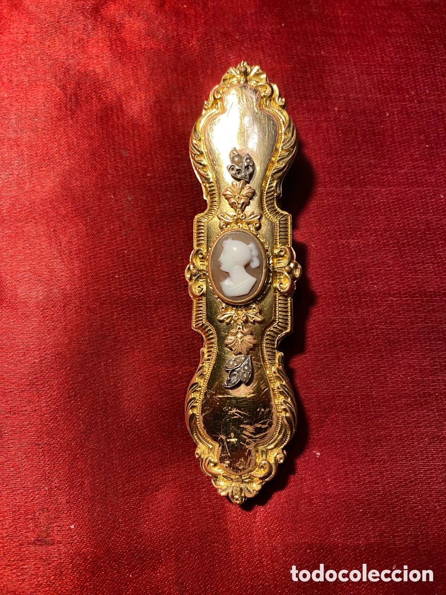 Joyeria: Preciosa joya isabelina con fuete chapado en oro para recoger el pelo.