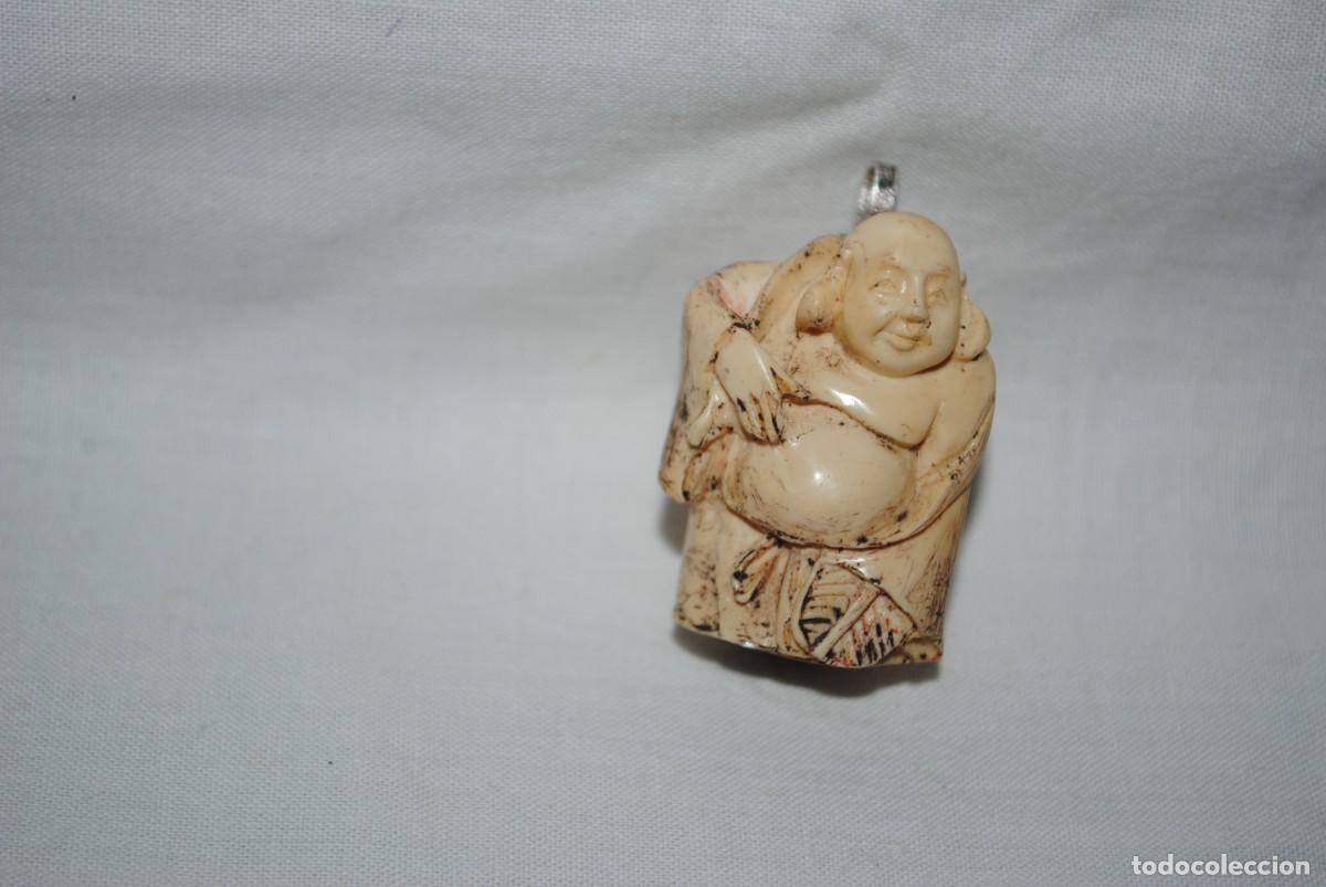 Joyeria: COLGANTE EN FORMA BUDA .