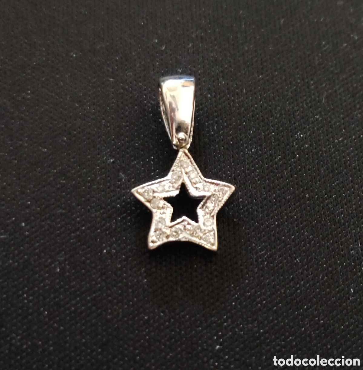Joyeria: Colgante. Estrella. Oro Blanco 14K. Brillantes. Joya.