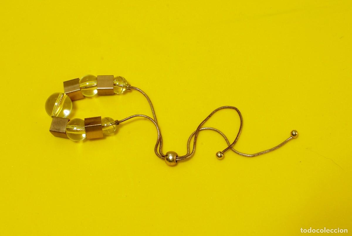 Joyeria: Original pulsera ajustable, cubos de lat&oacute;n con bolas transparentes