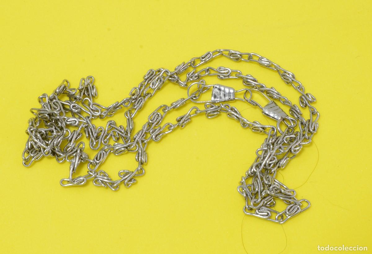Joyeria: CADENA DE METAL CON ENGANCHES EN LOS EXTREMOS 48 cm.