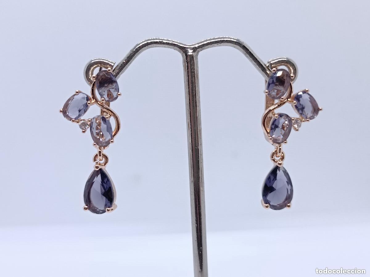 Joyeria: Maravillosos pendientes en oro de 14 quilates con amatistas engastadas