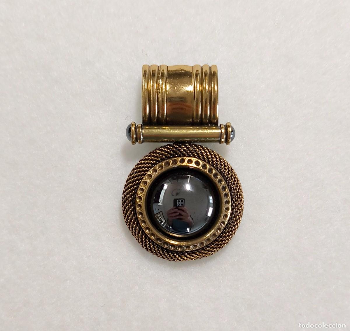 Joyeria: BROCHE VINTAGE DE ERMANI BULATTI REALIZADO EN BRONCE, LAT&Oacute;N Y ORO AMARILLO CON PIEDRAS NEGRAS.