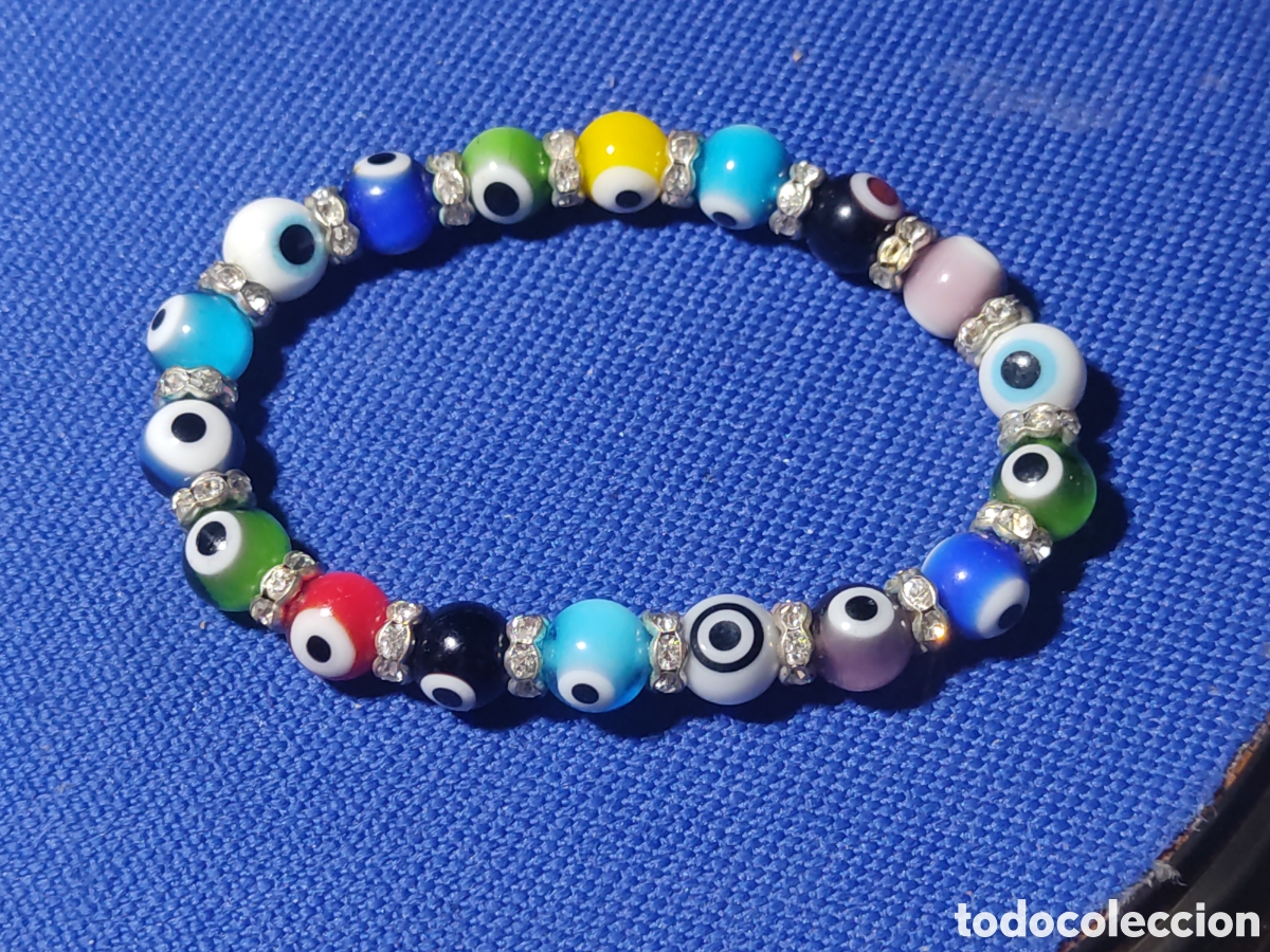 Joyeria: Pulsera ojo turco de cristal de Murano,cuentas de 8mm y abalorios de circonitas o cristales.Vintage.