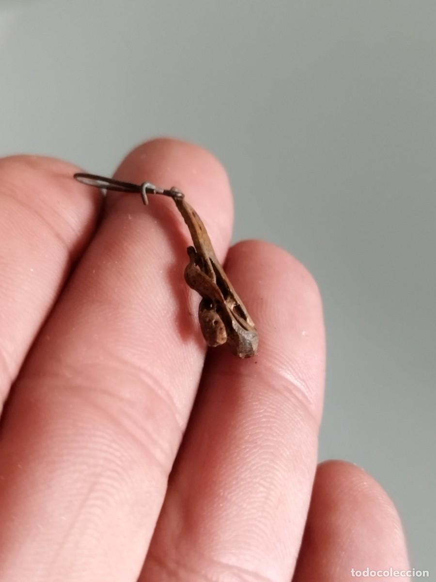 Joyeria: Antiguo pendiente a identificar.