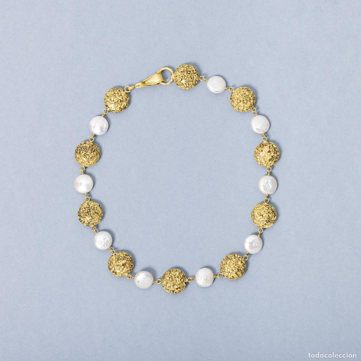 Jewelry: Collar con perlas en oro de 19,2 quilates.