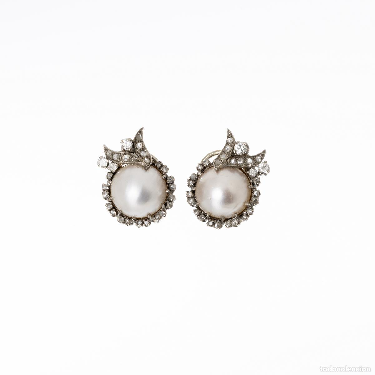 Joalharia: Par de pendientes de oro de 19,2 quilates y diamantes.