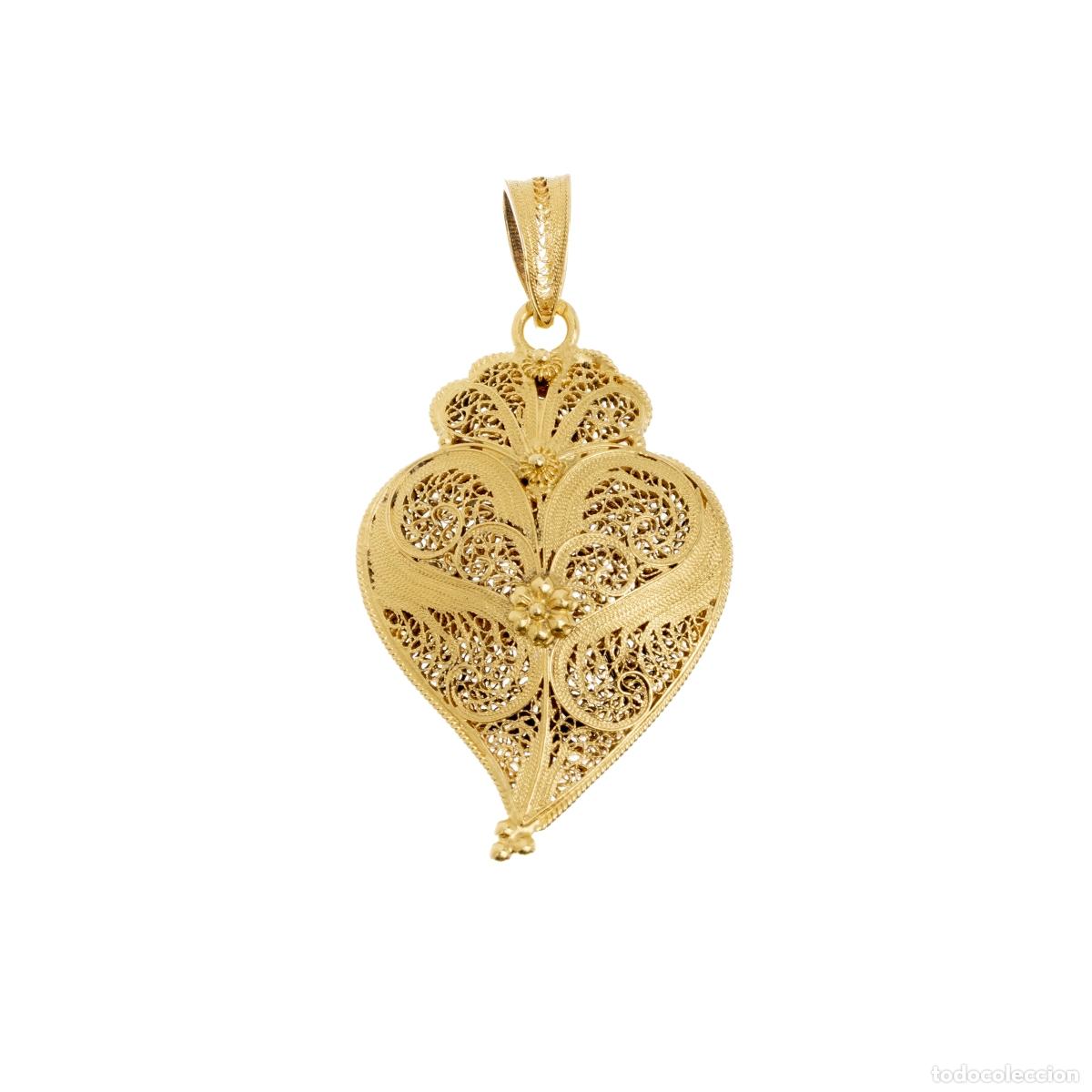 Gioielleria: Colgante en oro de 19,2 quilates