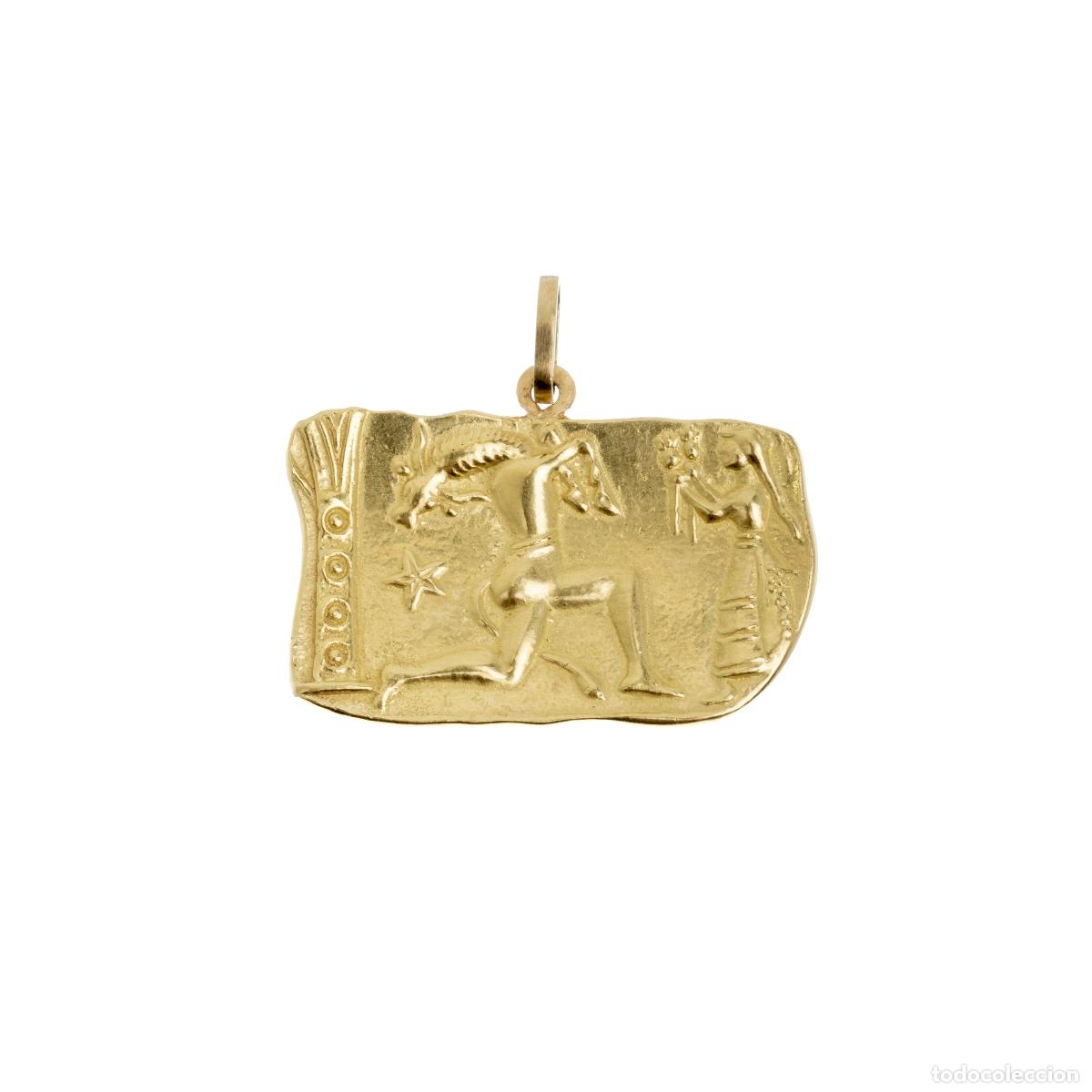 Gioielleria: Colgante en oro de 19,2 quilates
