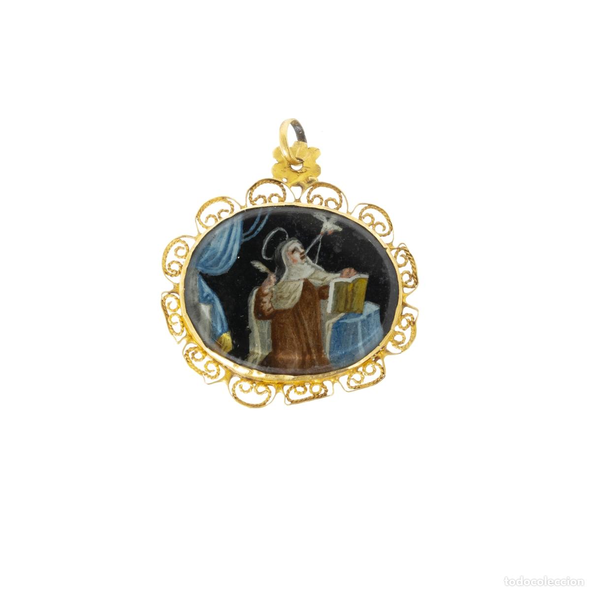 Gioielleria: Colgante devocional de oro - siglo XVII