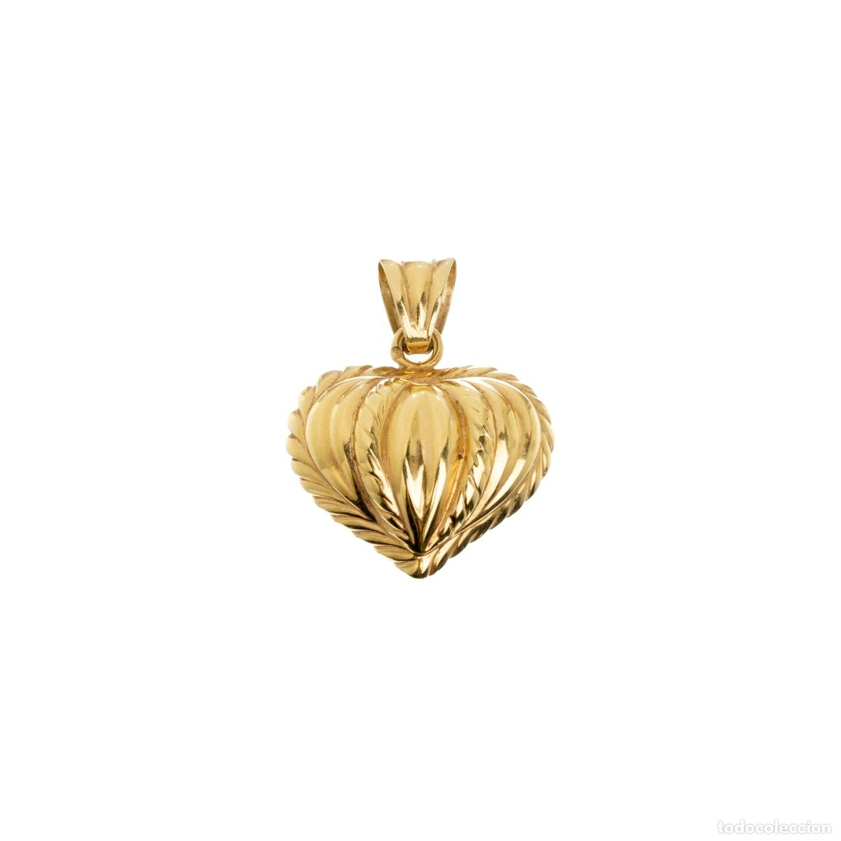 Gioielleria: Colgante en forma de coraz&oacute;n de oro de 19,2 quilates.