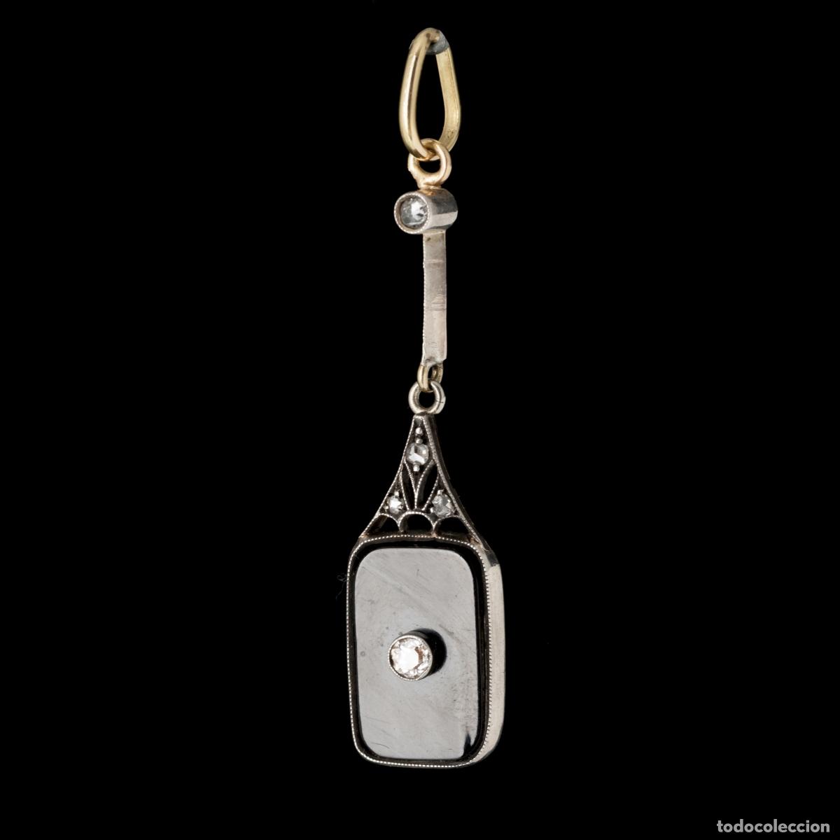 Gioielleria: Colgante de oro, plata y diamantes.