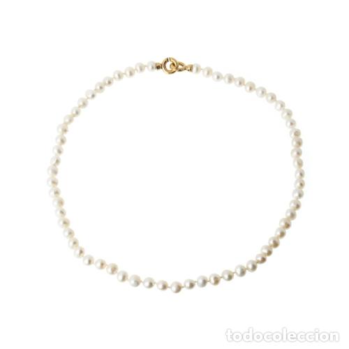 Joyeria: Collar de plata y perlas con cierre de oro de 19,2 quilates.