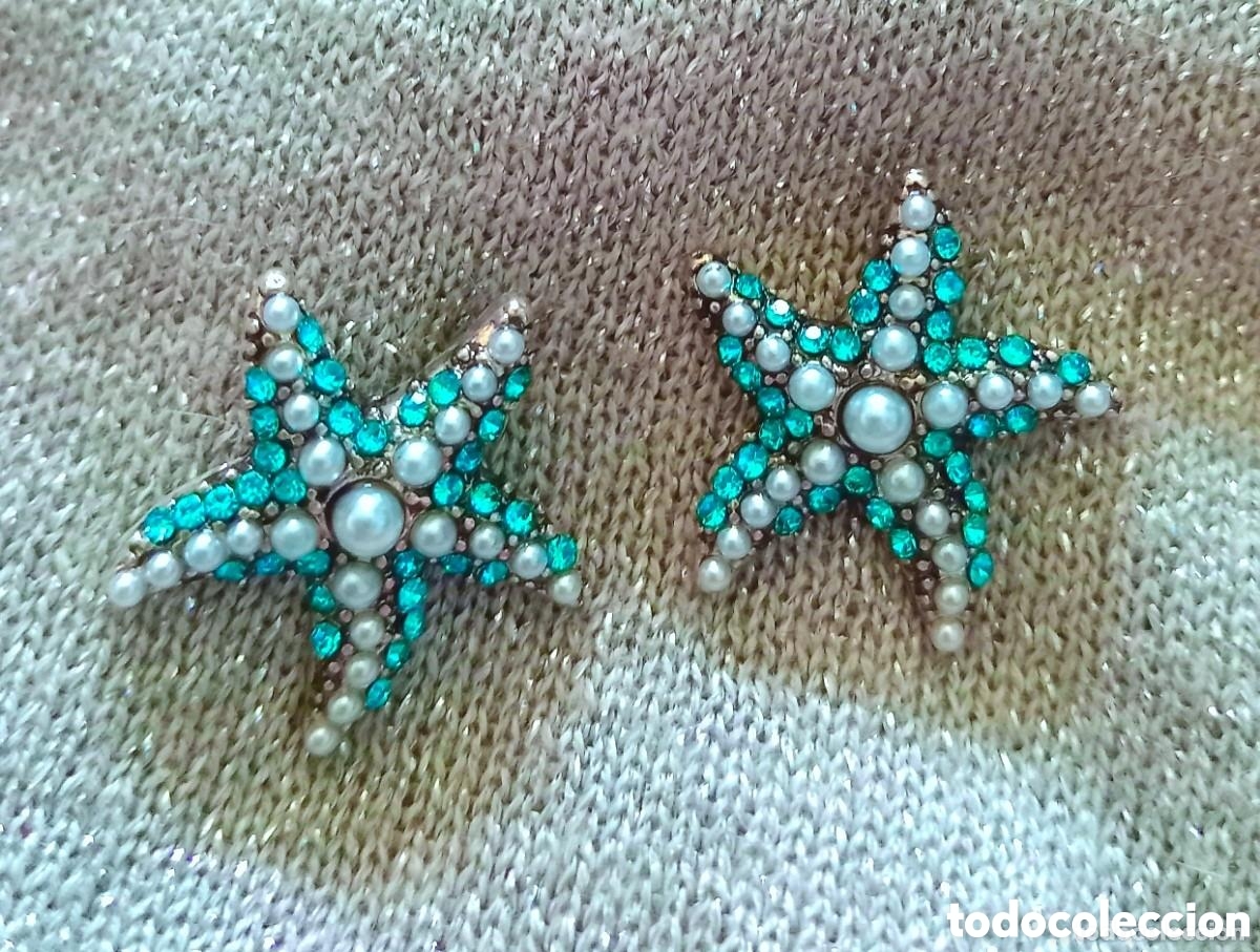 Joaillerie: Originales pendientes de bot&oacute;n estrella de mar con peque&ntilde;as incrustaciones azules brillantes y perla