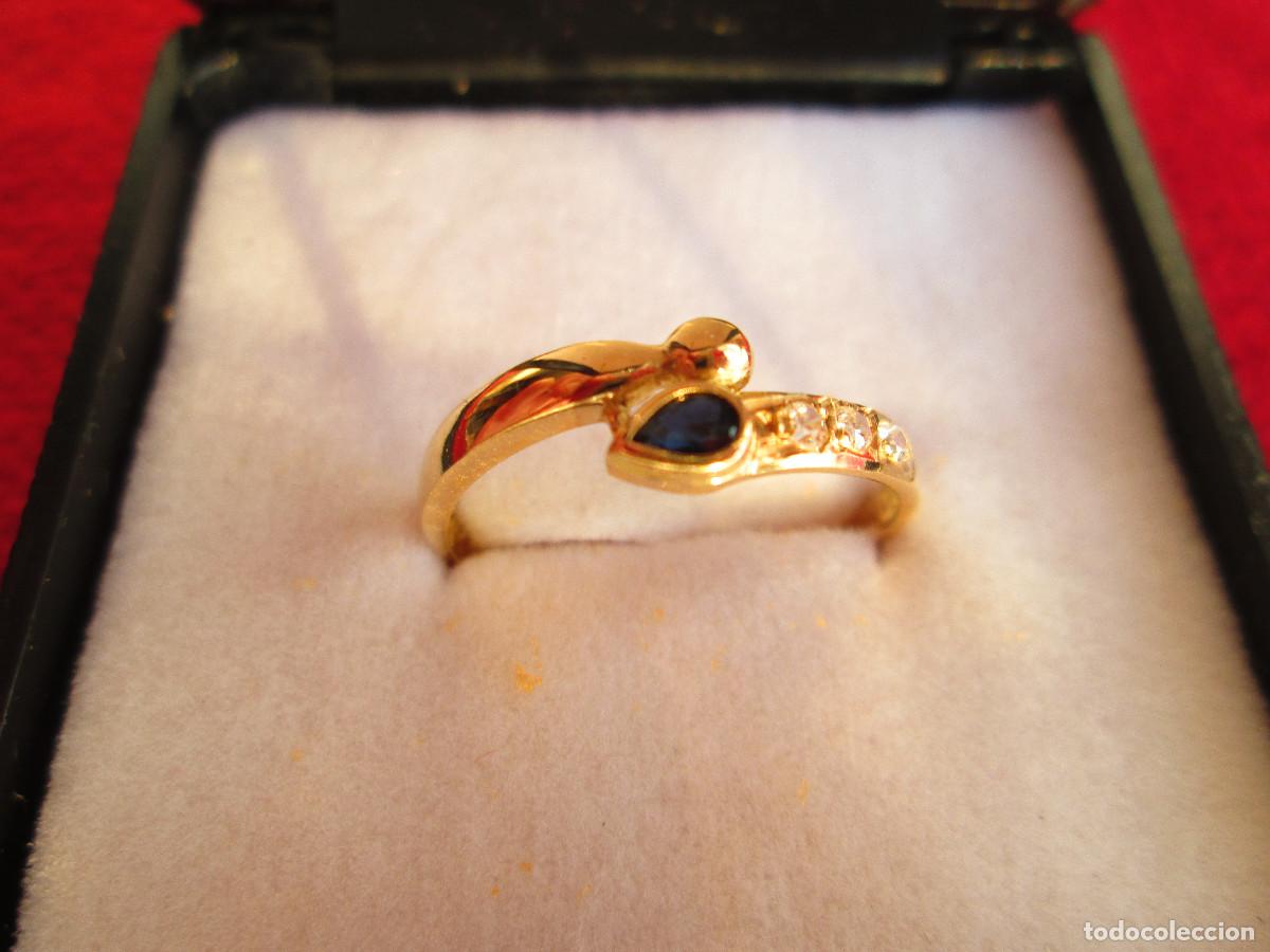 Schmuck: ANILLO DE ORO DE 18 KLTS. CON CIRCONITAS Y PIEDRA SEMIPRECIOSA NEGRA - SIN ESTRENAR -