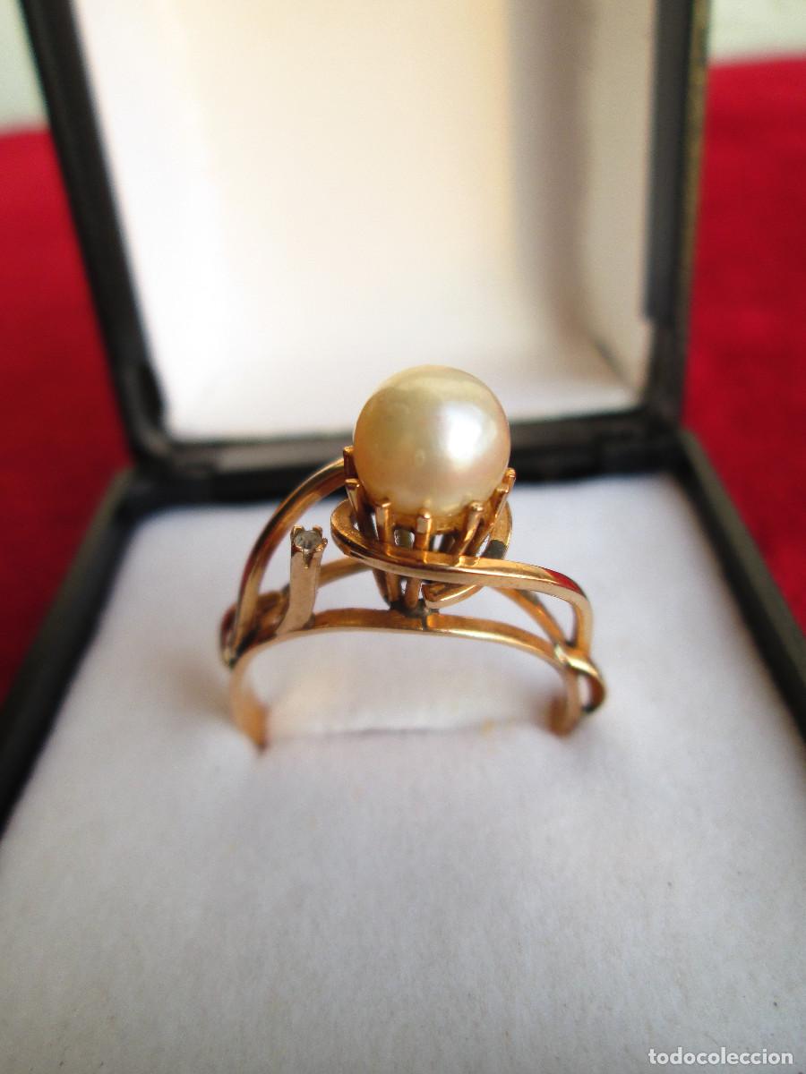 Schmuck: ANILLO DE ORO DE 18 KLTS. CON PERLA Y CIRCONITA ENGARZADA- SIN ESTRENAR -