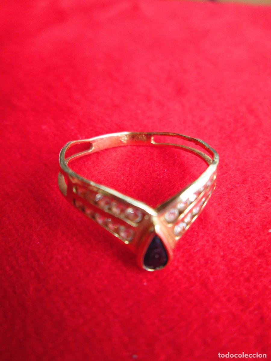 Schmuck: ANILLO DE ORO DE 18 KLTS. CON CIRCONITAS Y PIEDRA SEMIPRECIOSA NEGRA - SIN ESTRENAR-