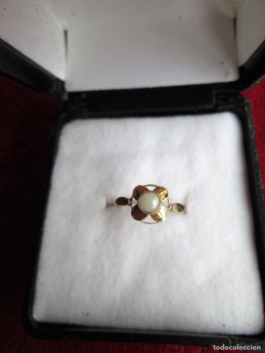 Jewelry: ANILLO DE ORO DE 18 KLTS. INFANTIL O PARA COLGAR DE CADENA - FLOR CON PERLA - SIN ESTRENAR -