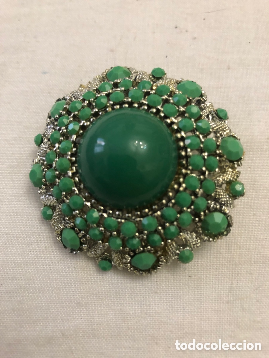 Joaillerie: Broche Verde circular elegante