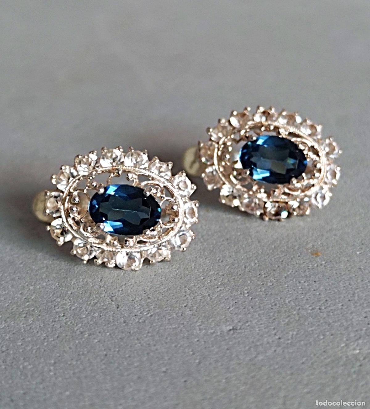 Joyeria: Pendientes de plata de ley contrastada, con piedra azul y circonitas, cierre de pala catal&aacute;n.