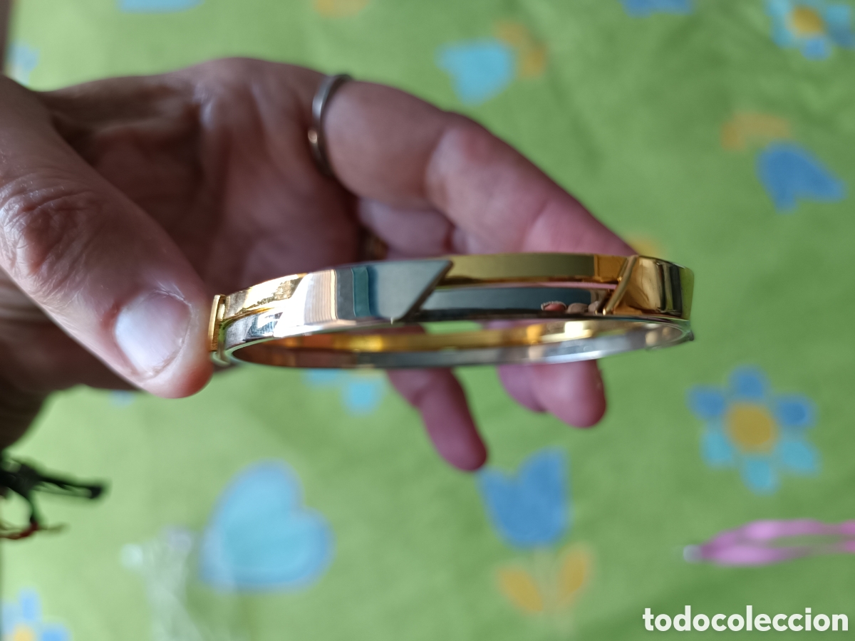 Joyeria: Brazalete en tonos dorados y plateados