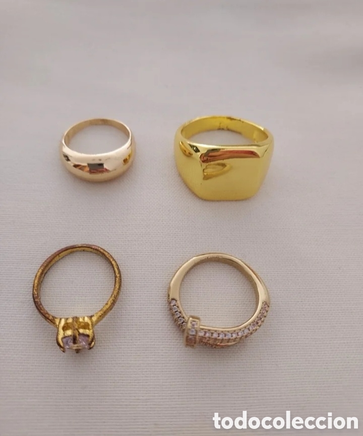Joyeria: Anillos bisuteria dorada - 4 piezas